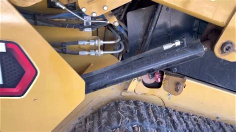 cat 259d3 hydraulic drain problems